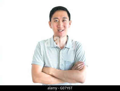 Asian man smiling crossed arms isolated on white background Stock Photo