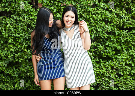 Two happy and lively female best friends having a good time together - friendship and fun time concept Stock Photo