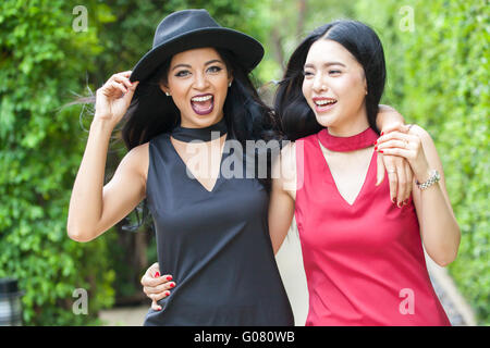 Two happy and lively female best friends having a good time together - friendship and fun time concept Stock Photo