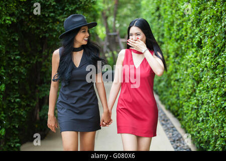 Two happy and lively female best friends having a good time together - friendship and fun time concept Stock Photo