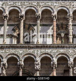 Detail exterior view of Lucca Cathedral (Duomo di Lucca, Cattedrale di San Martino) is a Roman Catholic cathedral dedicated to S Stock Photo