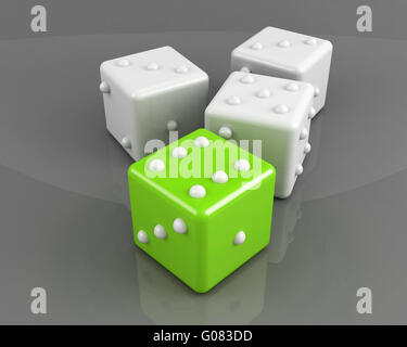 green winning dice on the grey background concept Stock Photo