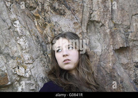 Portrait of a pensive young girl on the background Stock Photo