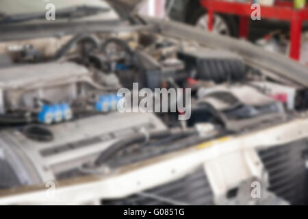 Defocus of Car engine in the hood Stock Photo