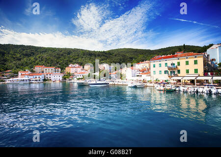 VALUN, CROATIA - August 26, 2914: View to the village Valun with harbor and boats, Cres island, Croatia Stock Photo