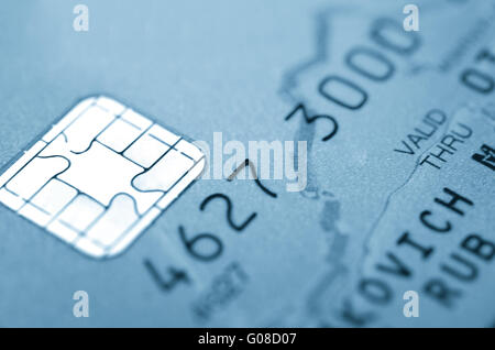 Details of a credit card with chip and numbers. Stock Photo