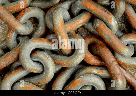 An Abstract Background Of Grungy Rusty Chains Stock Photo