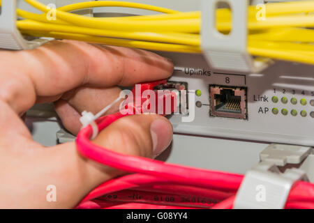 connecting network cable Stock Photo