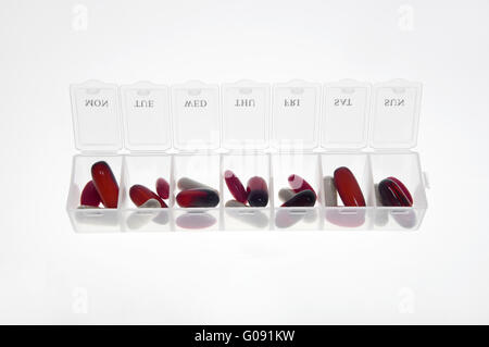 Pill box with variety of pills Stock Photo