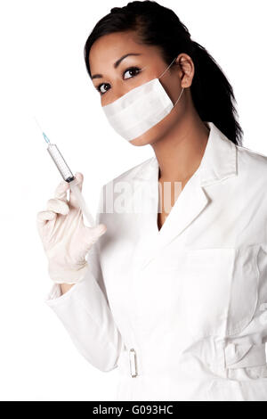 Beautifull Indonesian nurse with cap and serenge Stock Photo
