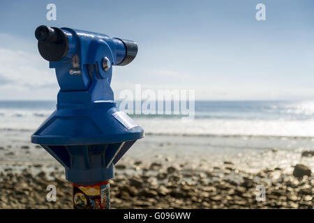 Binoculars at the beach Stock Photo