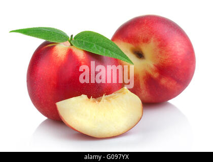 Ripe peach (nectarine) fruits with slices isolated Stock Photo