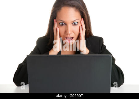 Woman in Panic Looking At A Computer Monitor Stock Photo