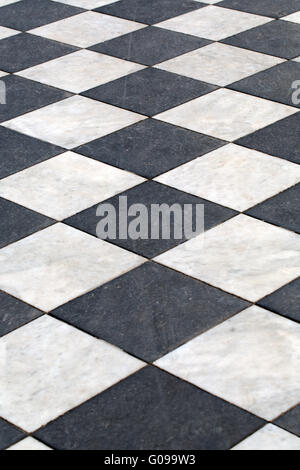 heckered marble floor going off into the distance Stock Photo