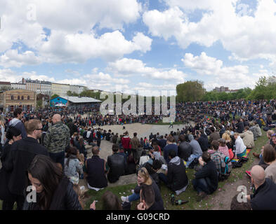 young people in crowded park on mayday /1. may in Berlin, Germany Stock Photo