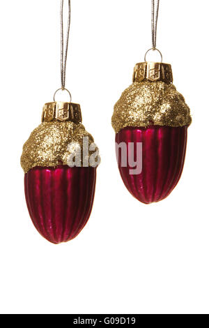 red and golden christmas balls as hazelnut hanging Stock Photo
