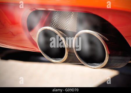 Smoky Exhaust Pipe Stock Photo