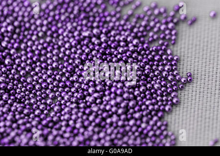 Pile purple balls of bead suitable for Background and texture Stock Photo