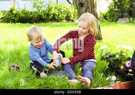 putting on shoes Stock Photo