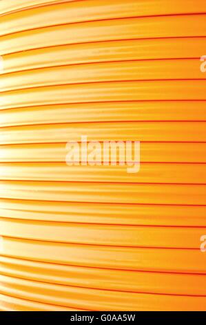 Fiber optic cable on the cable drum vertical Stock Photo