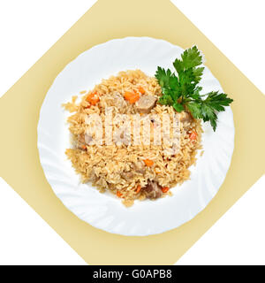 Dish of fried rice with meat(pilaf) on white plate Stock Photo