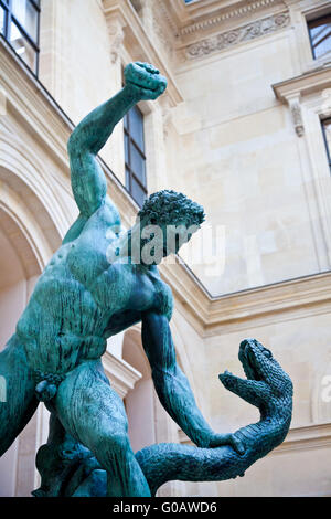 man fight snake sculpture Louvre museum Stock Photo: 76970354 - Alamy