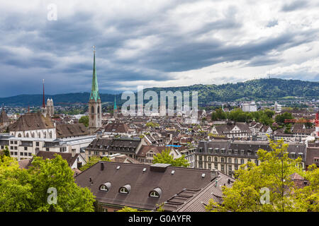 View of Zurich old town from the Zurichberg on a cloudy day, Switzerland Stock Photo