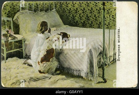 RUSSIA - 1908: shows Evening Prayer, Little Girl with Dog Stock Photo
