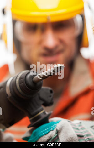 Engineer or manual worker man in safety hardhat he Stock Photo