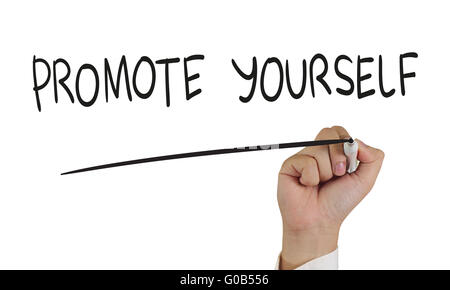 Motivational concept, image of a hand holding marker and write Promote Yourself isolated on white Stock Photo