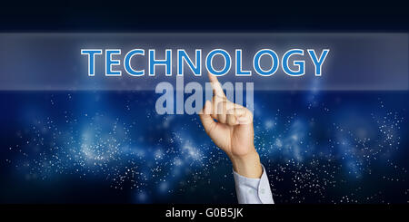 Business concept image of a businessman hand clicking Technology button on virtual screen over space background Stock Photo