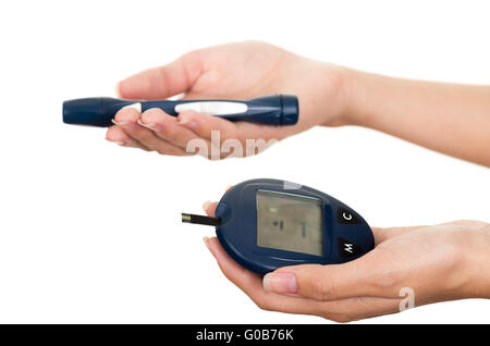 Hands holding glucose meter scanner pen and measure monitor in other hand with white background Stock Photo
