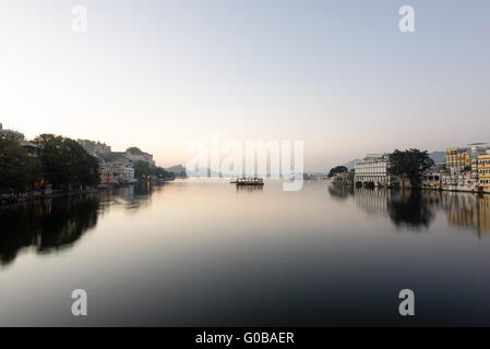 Calm Lake Pichola at dawn Stock Photo