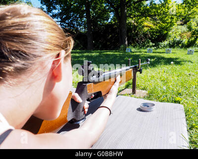 Young female shooter Stock Photo