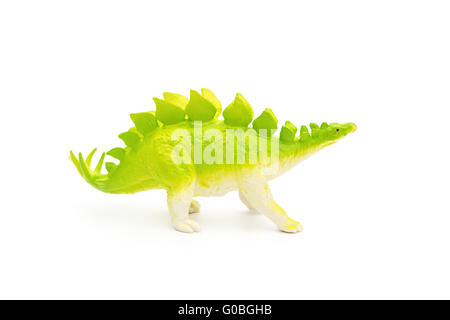 side view green stegosaurus toy on a white background Stock Photo