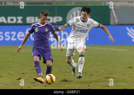 BUDAPEST, HUNGARY - MAY 27: (r-l) Endre Botka of Ferencvarosi TC challenges  Krisztian Simon of Ujpest FC during the Hungarian OTP Bank Liga match  between Ujpest FC and Ferencvarosi TC at Ferenc