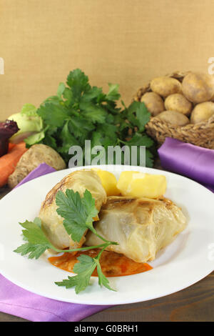 cabbage roulade with potatoes and sauce Stock Photo