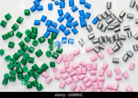 different dyed polymer pellets Stock Photo