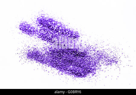 Purple glitter on light background - macro photo Stock Photo