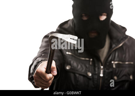 Criminal thief or burglar man in balaclava or mask Stock Photo