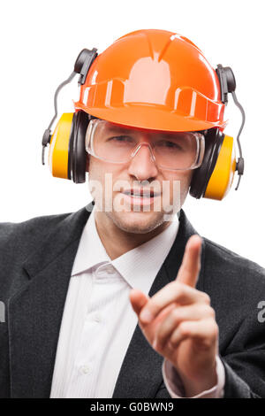 Businessman in safety hardhat helmet gesturing exc Stock Photo