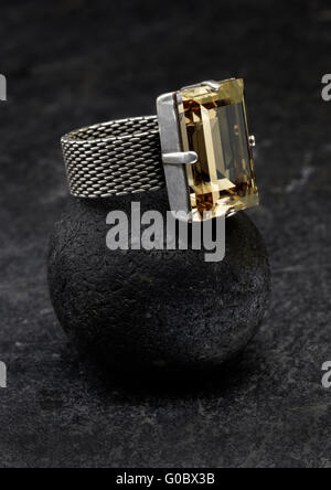 Silver ring with citrine Stock Photo