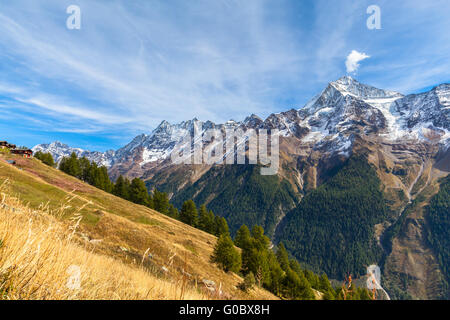 Panorama view of the Bietschhorn and mountain range of alps in canton of Valais from the hiking path above the Loetschental vall Stock Photo