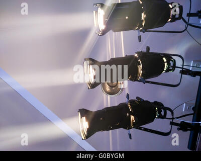 multiple spotlights on a theatre stage lighting rig Stock Photo