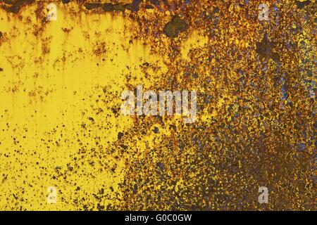 Rusty metal with yellow and red colours Stock Photo