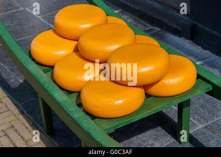 typical dutch load carrying big cheese wheels Stock Photo