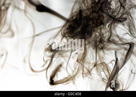 Beautiful smoke on the white background - macro photo Stock Photo