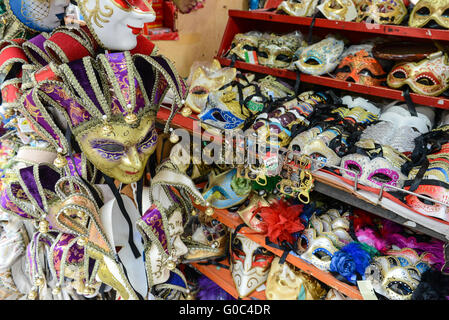 Vintage Venetian carnival masks for sale in Venice Italy Stock Photo