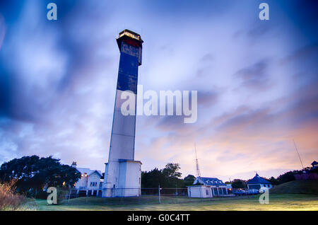 Charleston lighthouse at night  located on Sullivan's Island in South Carolina Stock Photo