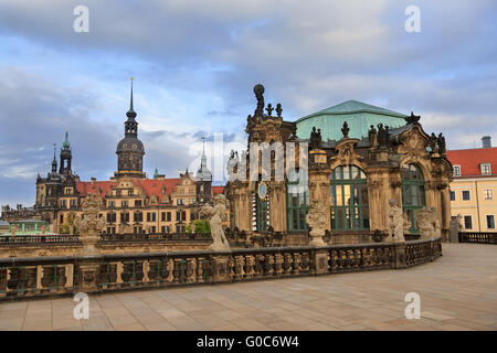 Closeup stone figure and Residenzschloss (city hall) on the back at Zwinger palace in Dresden Stock Photo